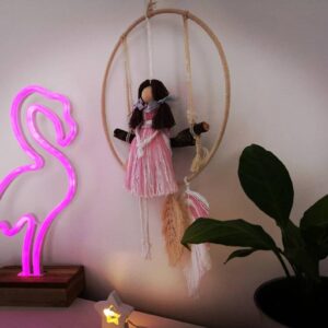 Handmade Macrame Doll On a Swing view from the right